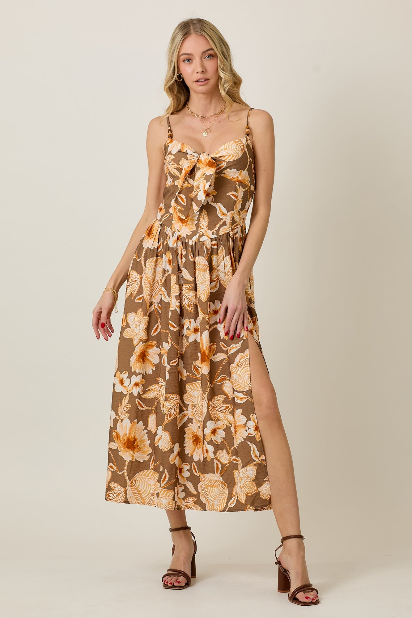 VESTIDO MIDI CON ESTAMPADO FLORAL Y CUENTAS