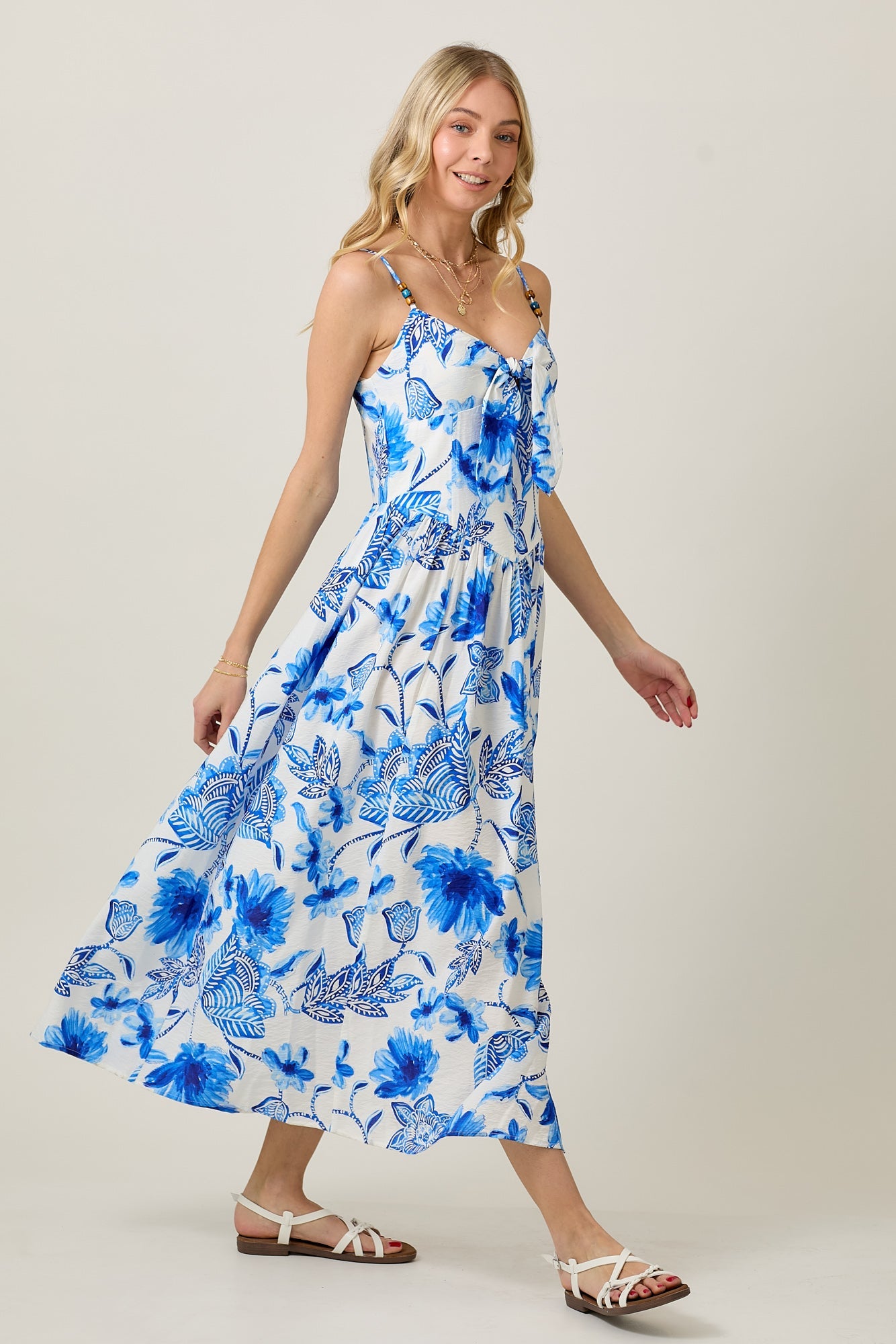 VESTIDO MIDI CON ESTAMPADO FLORAL Y CUENTAS