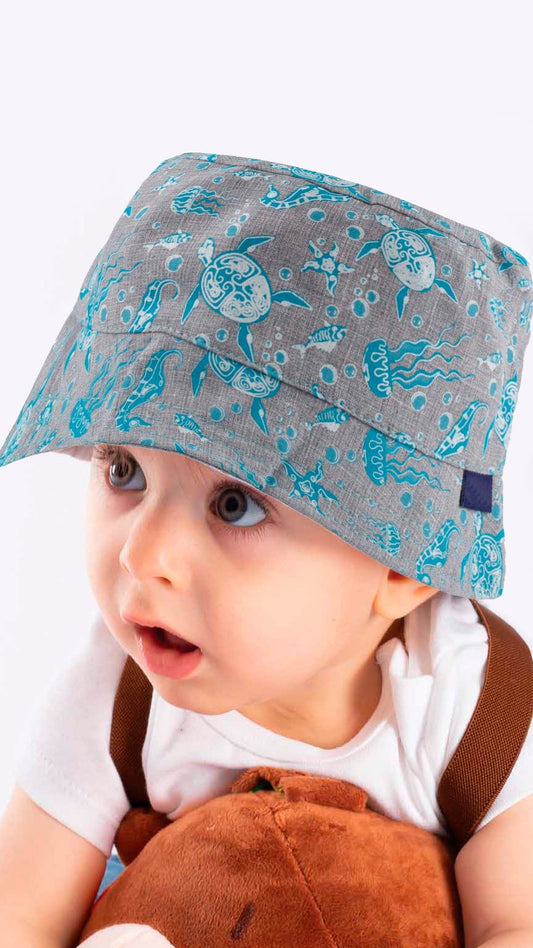 Gorro de pescador para bebé con estampado de vida marina, animales marinos y temática náutica